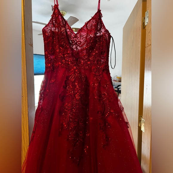 Selling thisprom dress never worn! is a XXL